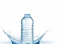 Bottled water in a splash of water